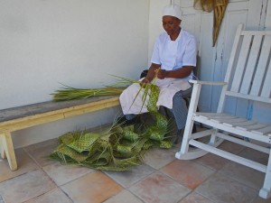 Women on Black Point weave long pieces and they are sent to Nasaau where they are finished into baskets.